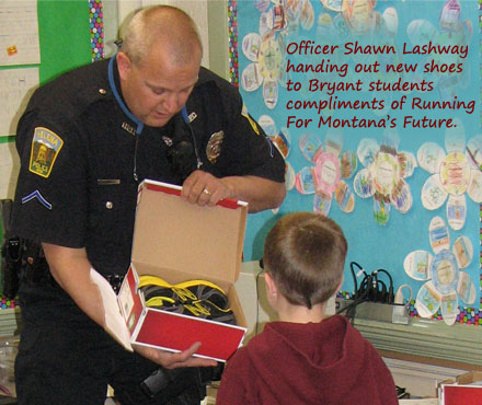 Shawn Lashway handing out new shoes